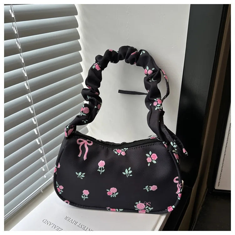 Stay stylish with these chic women's handbags made from nylon. Featuring a pleated design, these bags are perfect for the summer season, offering a trendy and functional accessory for your everyday outfits. -