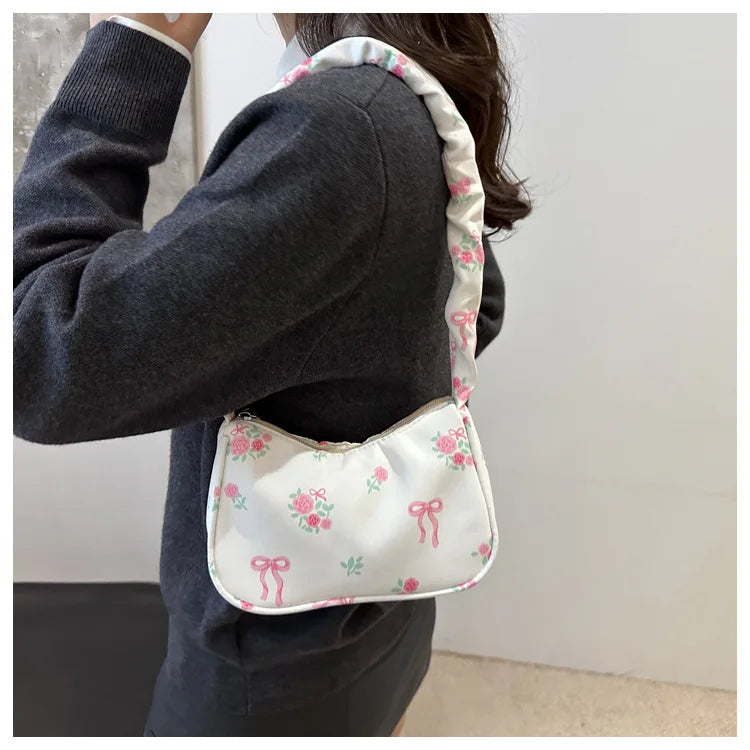 Stay stylish with these chic women's handbags made from nylon. Featuring a pleated design, these bags are perfect for the summer season, offering a trendy and functional accessory for your everyday outfits. -