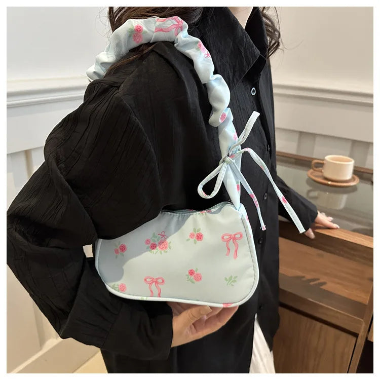Stay stylish with these chic women's handbags made from nylon. Featuring a pleated design, these bags are perfect for the summer season, offering a trendy and functional accessory for your everyday outfits. -