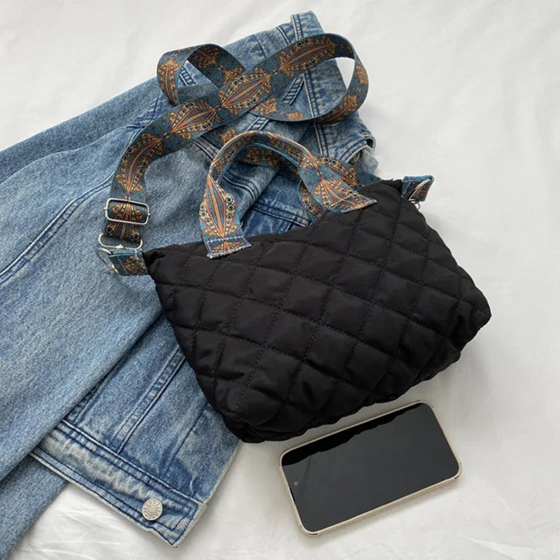 Elevate your style with these luxury designer shoulder crossbody bags for women. Featuring a quilted padded design from a top designer brand, these handbags are perfect for adding a touch of elegance to any outfit. -