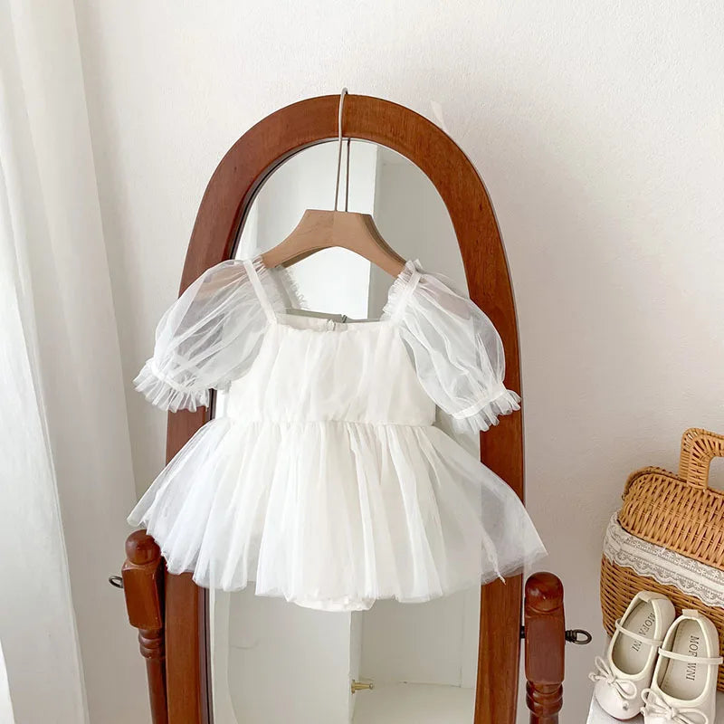 Dress your toddler in sweet style with this new baby lace dress featuring a big bowknot and short sleeves—perfect for special occasions! -