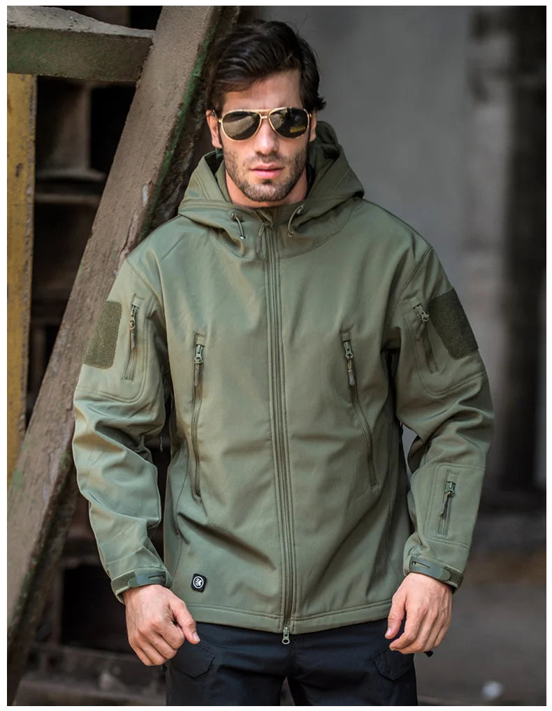 Stay prepared for any weather conditions with this tactical windproof and waterproof jacket for men. This versatile and durable jacket is perfect for outdoor activities and ensuring optimal protection from the elements. -