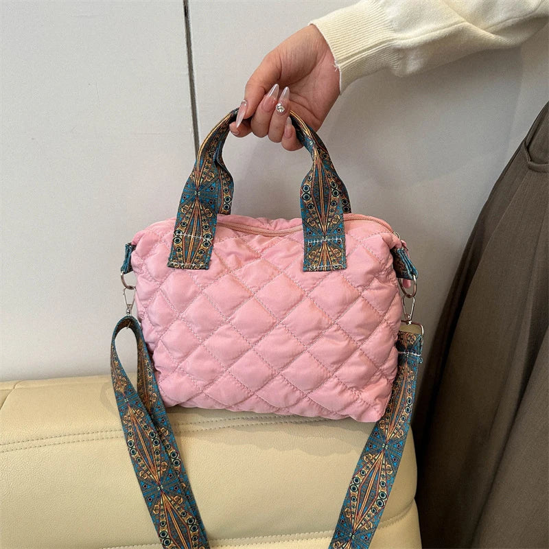 Elevate your style with these luxury designer shoulder crossbody bags for women. Featuring a quilted padded design from a top designer brand, these handbags are perfect for adding a touch of elegance to any outfit. -