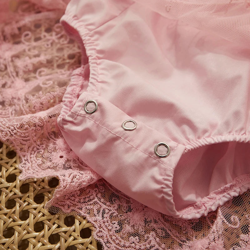 Dress your little one to impress with this adorable party romper for baby girls—perfect for special occasions and celebrations! -