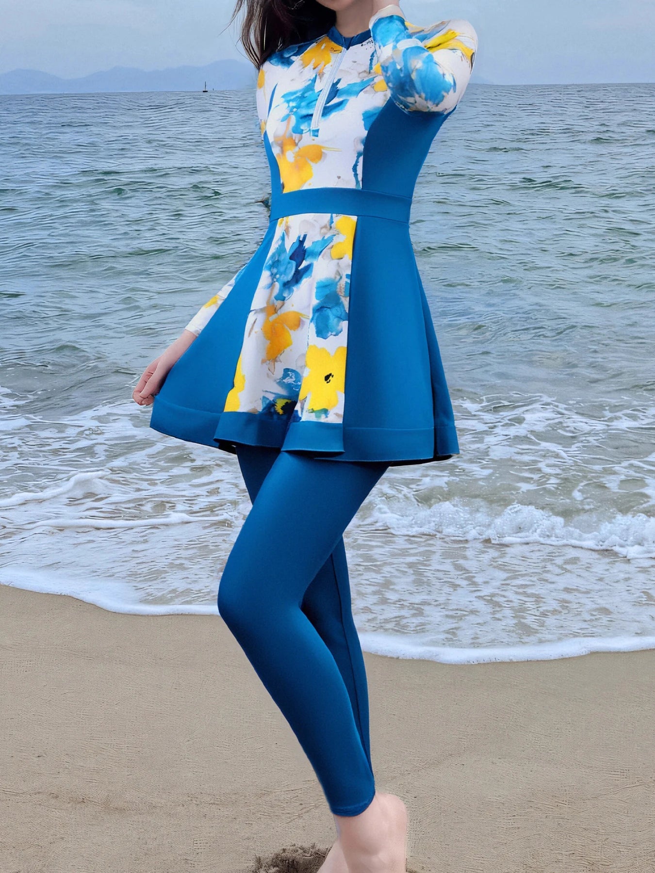 Stay covered and stylish in this long-sleeved swimsuit for women, perfect for added sun protection and a chic beach look. -
