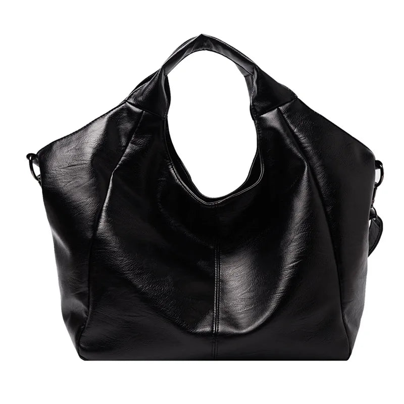 Make a stylish statement with these large shoulder bags designed for women. Crafted from soft leather, these fashionable handbags are perfect for adding a touch of sophistication to any outfit. -
