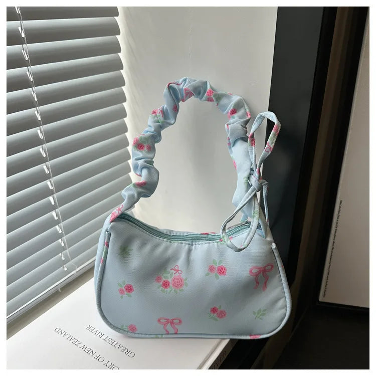 Stay stylish with these chic women's handbags made from nylon. Featuring a pleated design, these bags are perfect for the summer season, offering a trendy and functional accessory for your everyday outfits. -