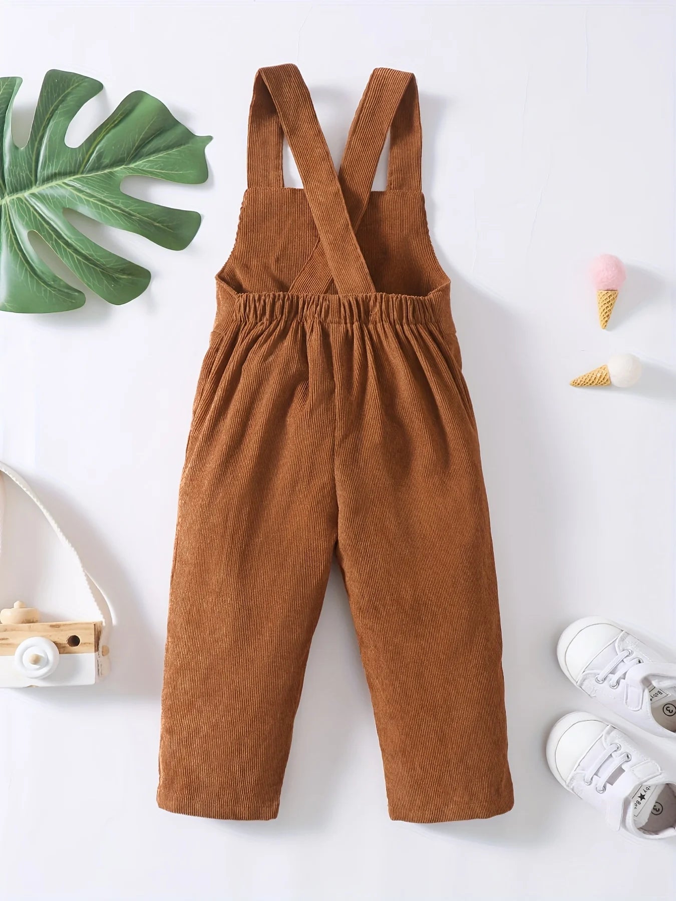 Dress your toddler boy or girl in cozy style with these brown corduroy strap pants—perfect for everyday comfort and cuteness 0-3 Years! -