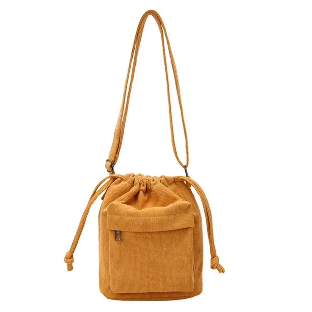 Carry your essentials in style with this cute middle shoulder drawstring bucket bag—a versatile and fashionable accessory for women on the go! -