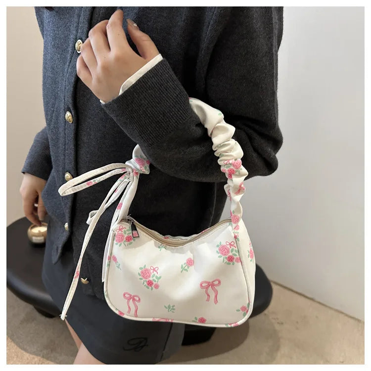 Stay stylish with these chic women's handbags made from nylon. Featuring a pleated design, these bags are perfect for the summer season, offering a trendy and functional accessory for your everyday outfits. -