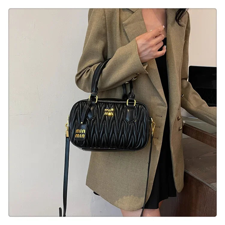 Stay stylish and organized with this new women's small square bag. With a versatile design that allows for multiple carrying options, this crossbody tote is perfect for daily use, providing both fashion and functionality in one chic accessory. -