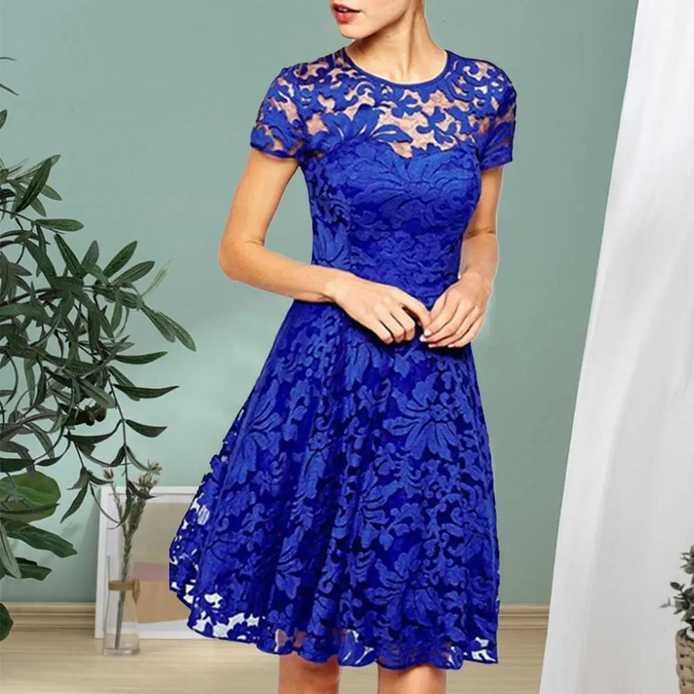Make a chic statement with this elegant women's dress featuring an O-neck design, transparent lace, and hollow detail—a perfect choice for a sophisticated and stylish look. -