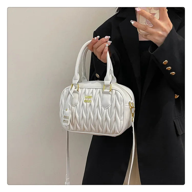 Stay stylish and organized with this new women's small square bag. With a versatile design that allows for multiple carrying options, this crossbody tote is perfect for daily use, providing both fashion and functionality in one chic accessory. -