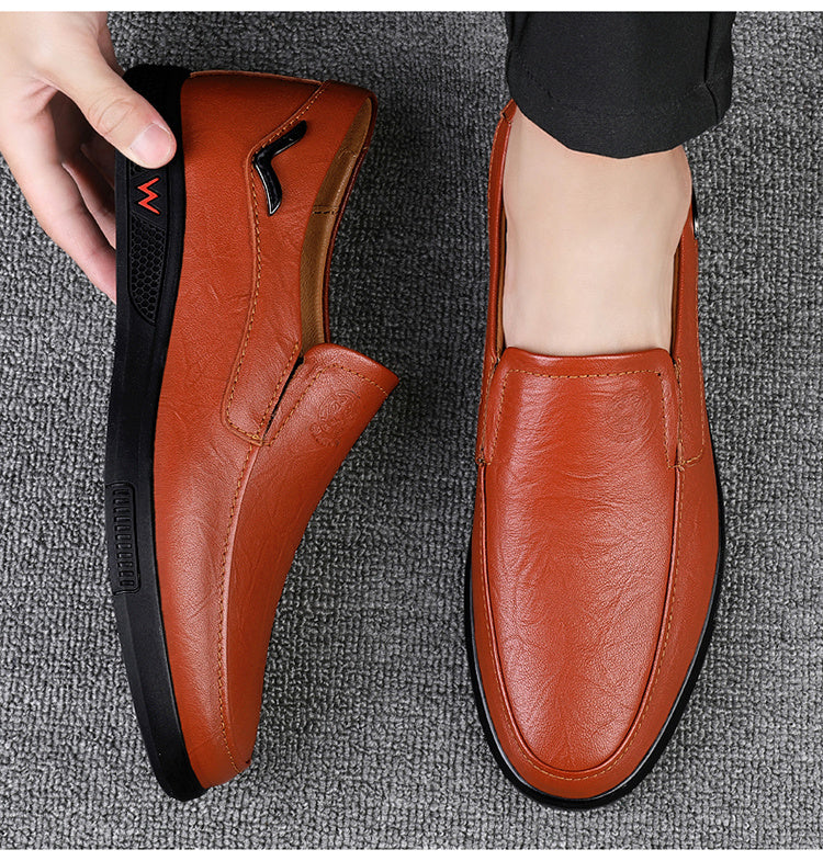 Step into comfort and safety with these men's genuine leather slip-on, slip-resistant shoes! -