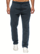 Stay comfy and warm in these men's solid color fleece-lined joggers! -