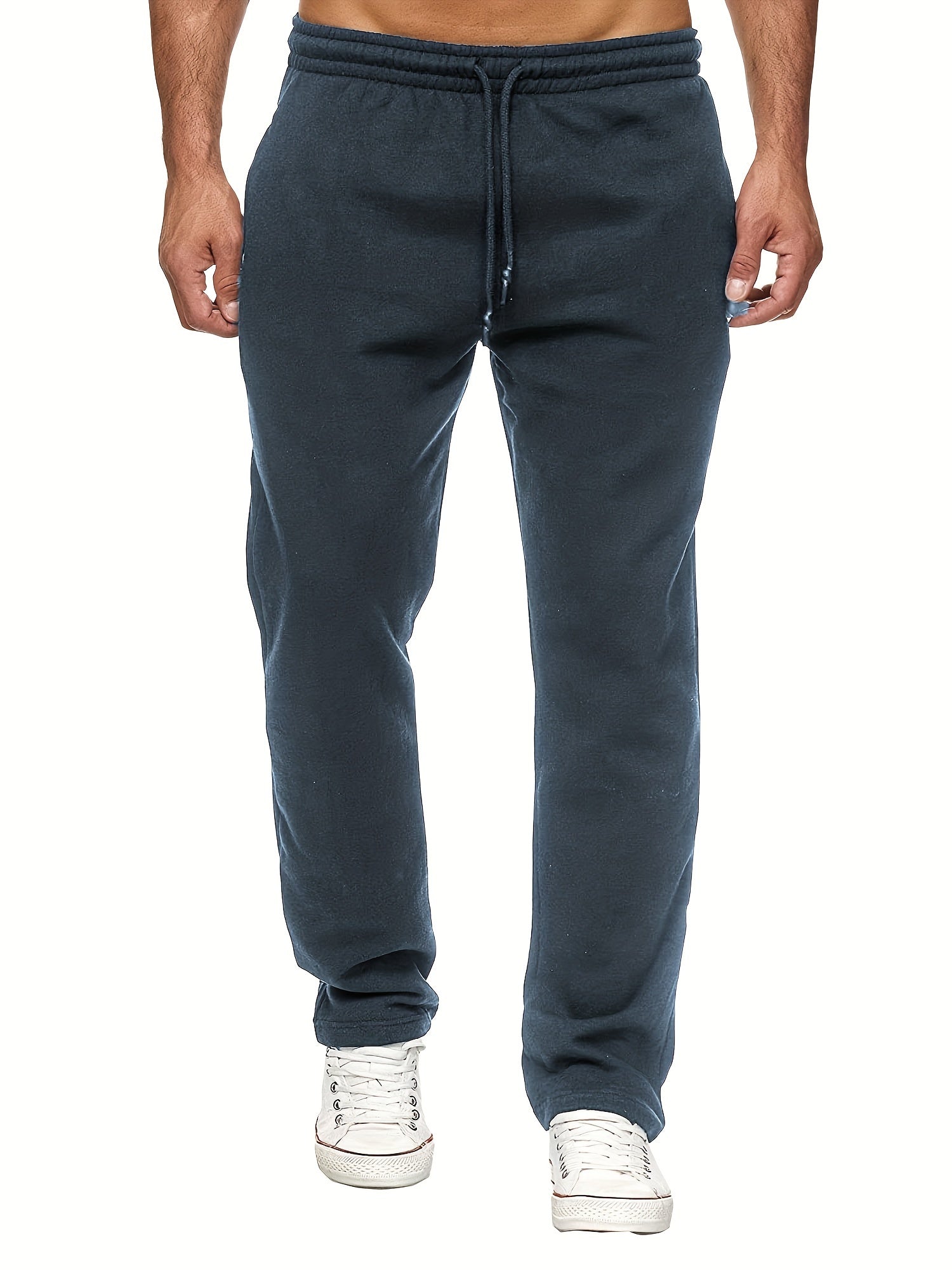 Stay comfy and warm in these men's solid color fleece-lined joggers! -