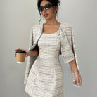 Elevate your style with this fashionable and elegant two-piece dress set for women—perfect for making a chic, polished statement! -