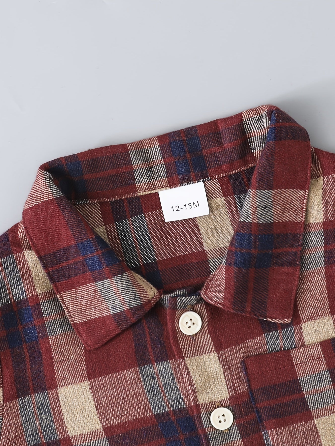 Dress him up in style with this boy's casual plaid button-up shirt and ripped denim pants set—cool and comfy! -