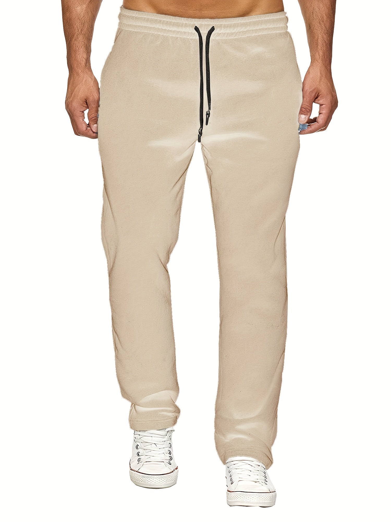 Stay comfy and warm in these men's solid color fleece-lined joggers! -