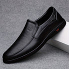 Step into comfort and safety with these men's genuine leather slip-on, slip-resistant shoes! -