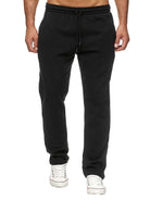 Stay comfy and warm in these men's solid color fleece-lined joggers! -