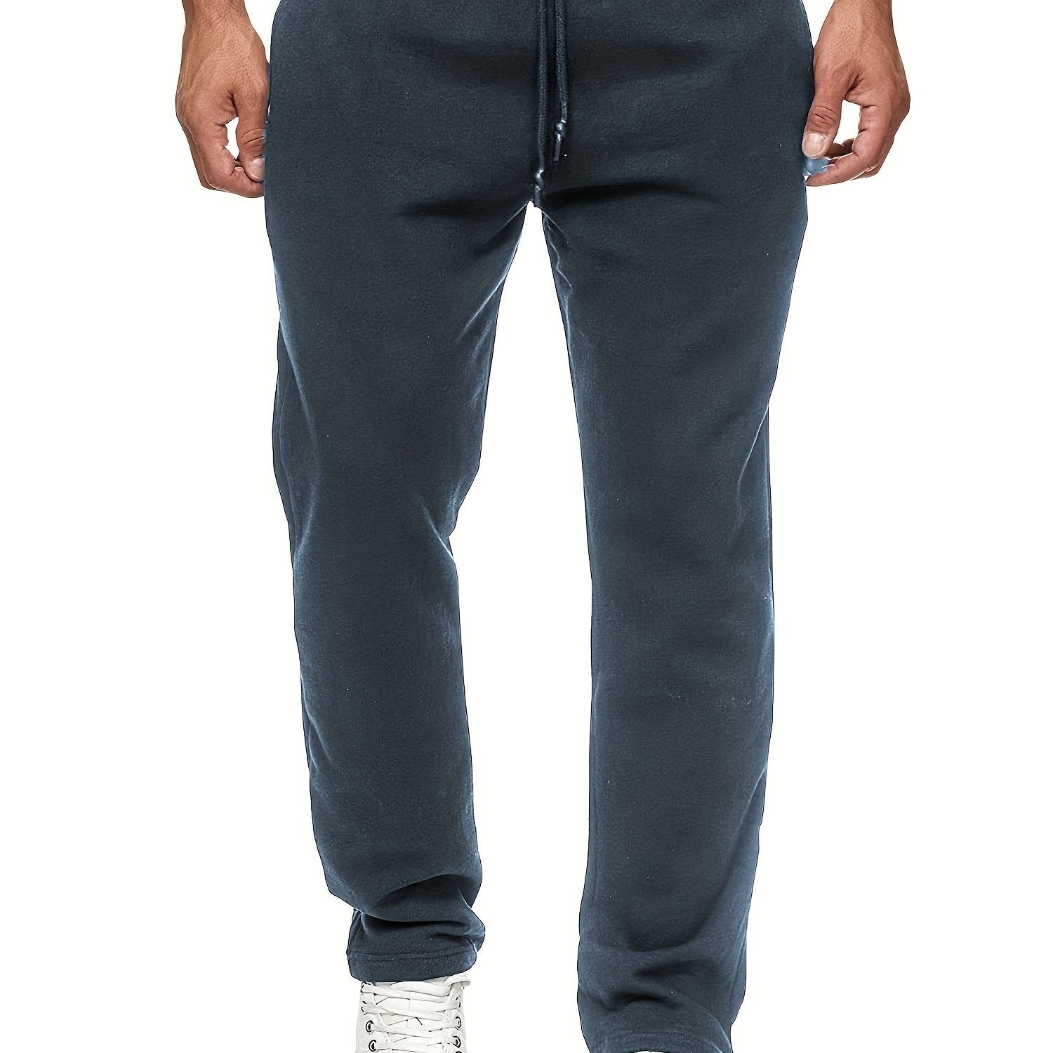 Stay comfy and warm in these men's solid color fleece-lined joggers! -