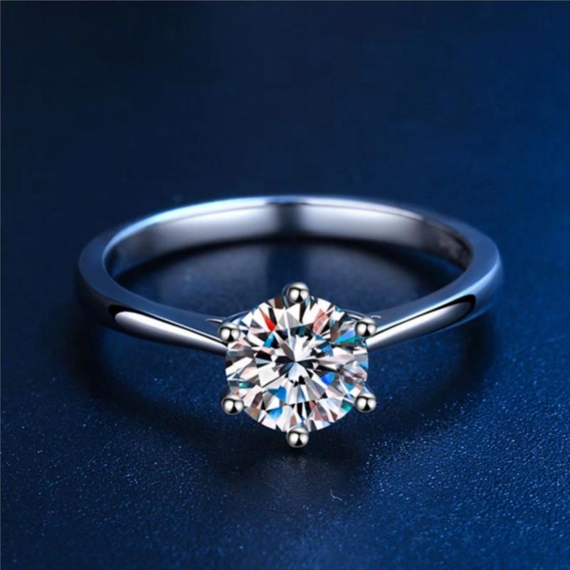 Sparkle bright with this women's one-carat silver moissanite ring! -