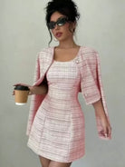 Elevate your style with this fashionable and elegant two-piece dress set for women—perfect for making a chic, polished statement! -