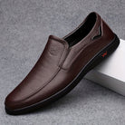Step into comfort and safety with these men's genuine leather slip-on, slip-resistant shoes! -