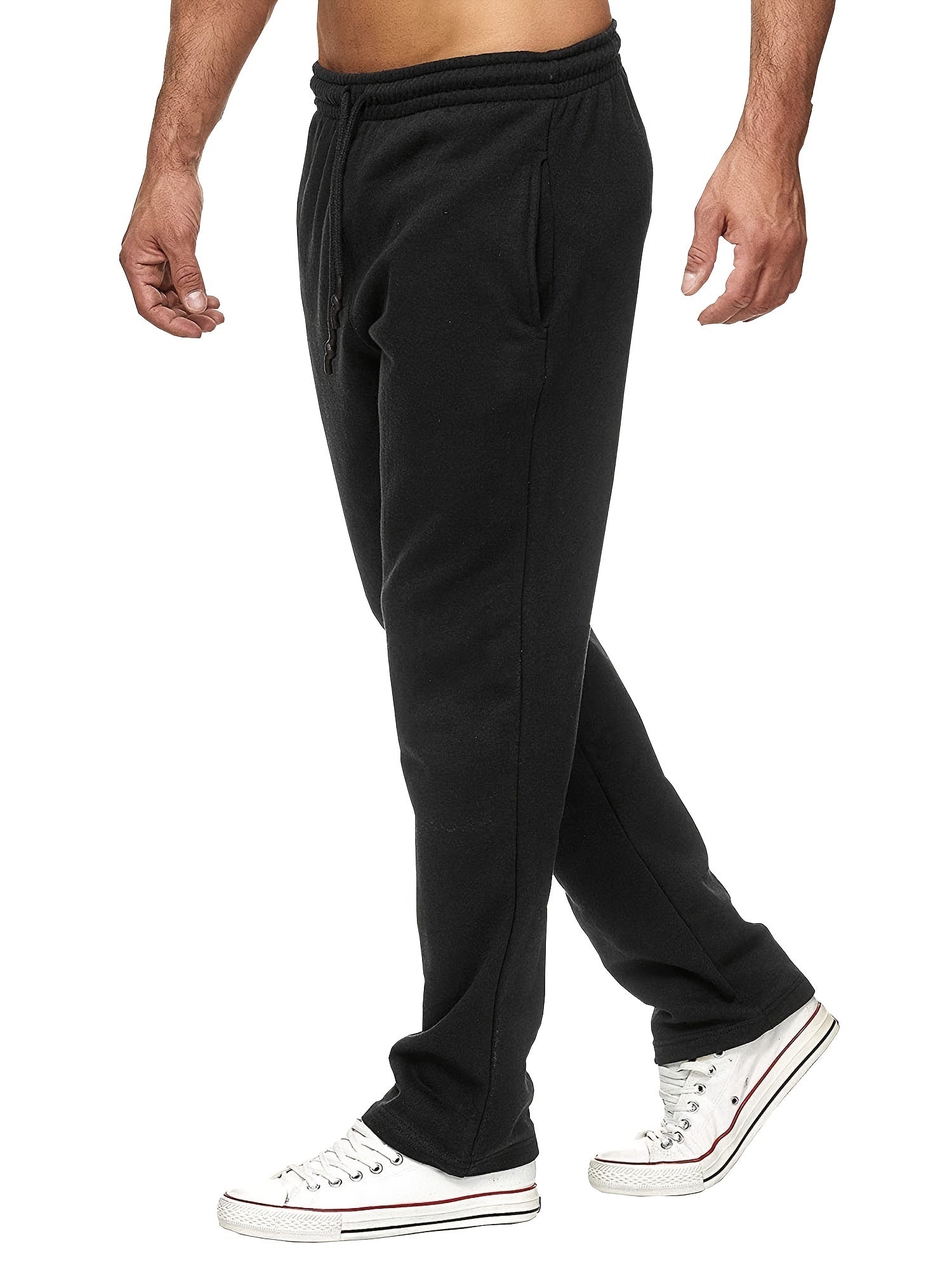 Stay comfy and warm in these men's solid color fleece-lined joggers! -
