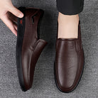 Step into comfort and safety with these men's genuine leather slip-on, slip-resistant shoes! -