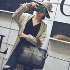 Make a statement with these luxurious handbags for women, crafted from leather and designed to be worn as shoulder bags. Elevate your style with these sac de luxe femme accessories, perfect for a chic and sophisticated look! -
