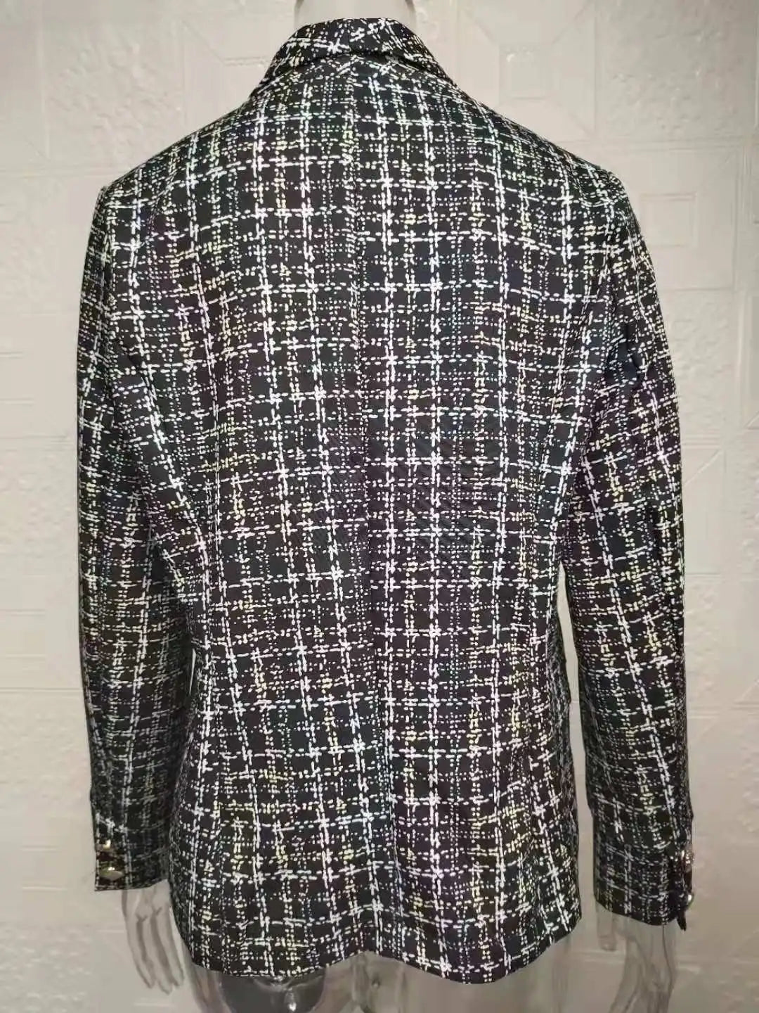 Make a statement in this double-breasted blazer—classy and confident! -