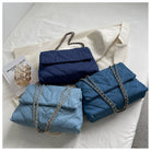 Elevate your style with this fashion luxury denim blue shoulder bag for women. Designed as a briefcase, this handbag is a chic and stylish accessory for a sophisticated and classy look. -