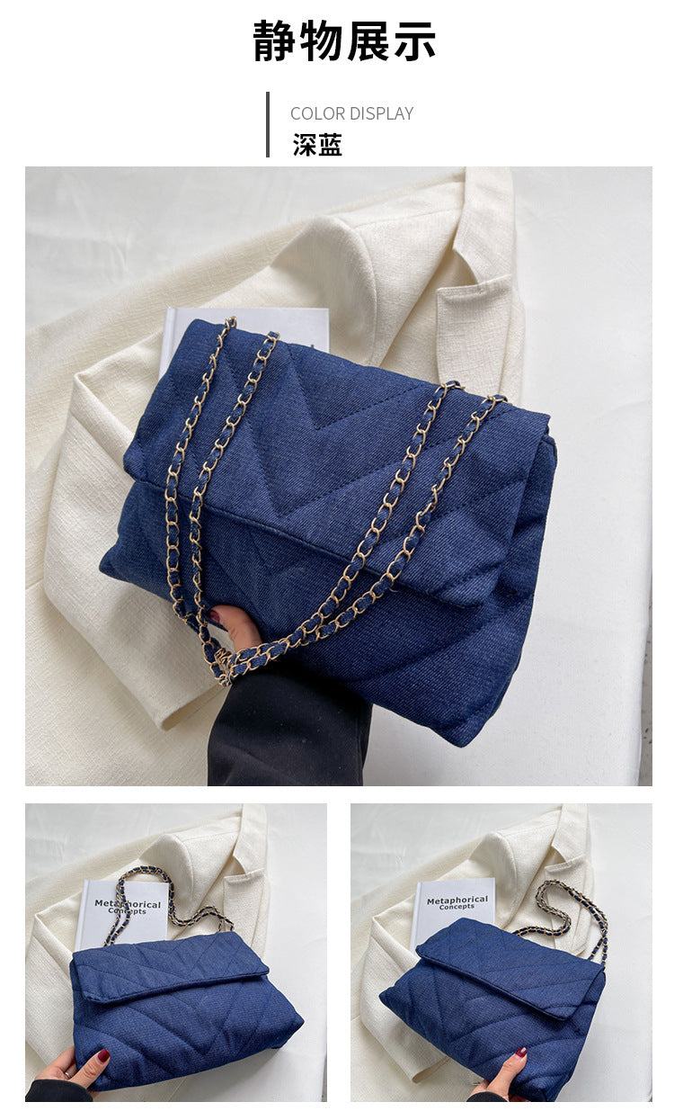 Elevate your style with this fashion luxury denim blue shoulder bag for women. Designed as a briefcase, this handbag is a chic and stylish accessory for a sophisticated and classy look. -