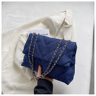 Elevate your style with this fashion luxury denim blue shoulder bag for women. Designed as a briefcase, this handbag is a chic and stylish accessory for a sophisticated and classy look. -