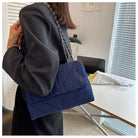 Elevate your style with this fashion luxury denim blue shoulder bag for women. Designed as a briefcase, this handbag is a chic and stylish accessory for a sophisticated and classy look. -