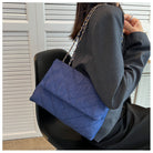 Elevate your style with this fashion luxury denim blue shoulder bag for women. Designed as a briefcase, this handbag is a chic and stylish accessory for a sophisticated and classy look. -