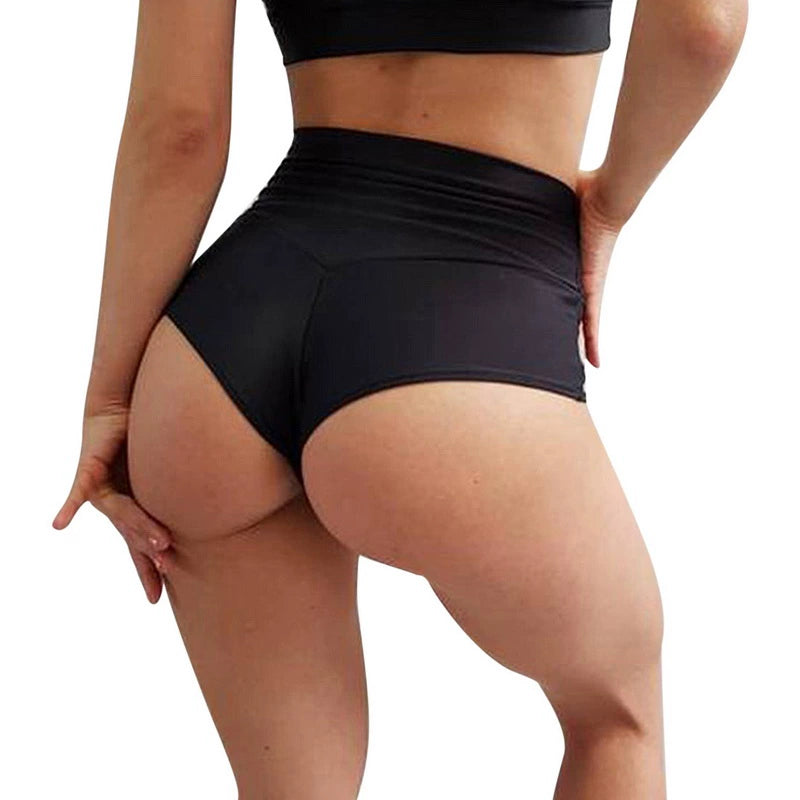Elevate your workout wardrobe with these solid color high-waisted yoga shorts, designed for a flattering fit and maximum comfort during exercise sessions! -