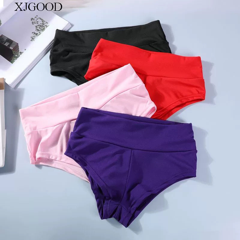 Elevate your workout wardrobe with these solid color high-waisted yoga shorts, designed for a flattering fit and maximum comfort during exercise sessions! -