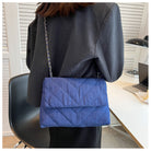 Elevate your style with this fashion luxury denim blue shoulder bag for women. Designed as a briefcase, this handbag is a chic and stylish accessory for a sophisticated and classy look. -