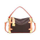 Make a statement with this luxurious and elegant box bag for women. Crafted from high-quality leather, this shoulder handbag features an elegant top-handle design, exuding sophistication and style for a classy finishing touch to your ensemble. -