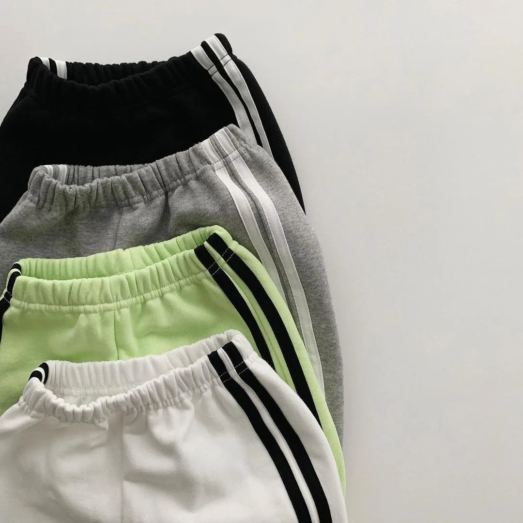 Keep your little one stylish and comfy with this cool two-piece baby suit—featuring a letter-printed zip-up top and matching leisure sports pants! -