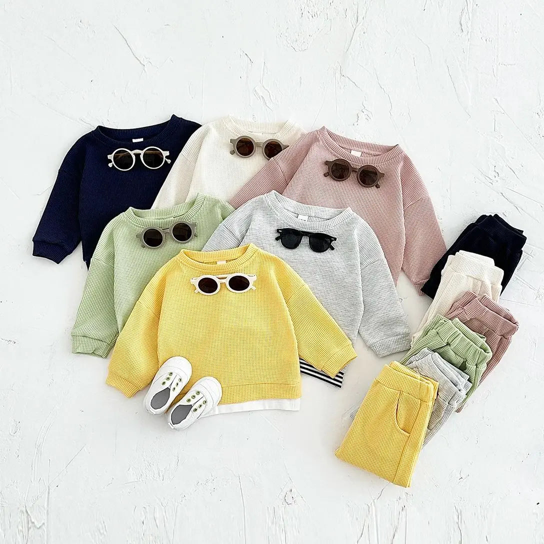 Dress your little one in comfort with this new baby clothes set—featuring a loose waffle cotton tracksuit perfect for kids on the move 0-3 Years Old -