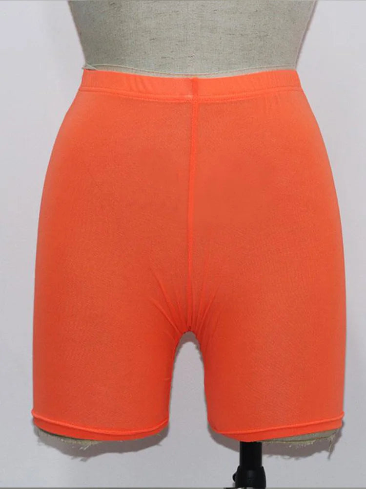 Stay stylish and comfortable with these yellow mesh transparent casual shorts for women—perfect for a fashionable and chic look! -
