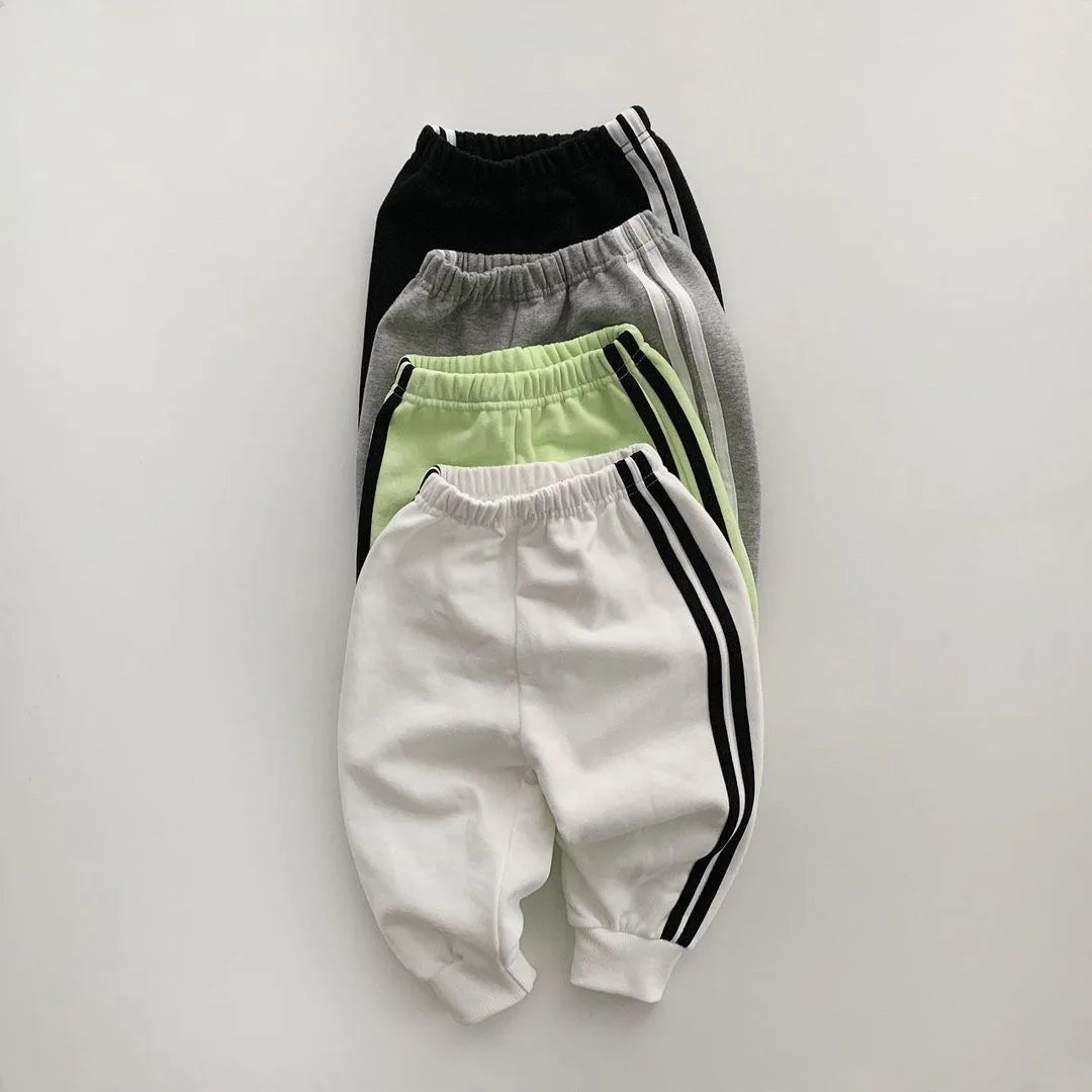 Keep your little one stylish and comfy with this cool two-piece baby suit—featuring a letter-printed zip-up top and matching leisure sports pants! -