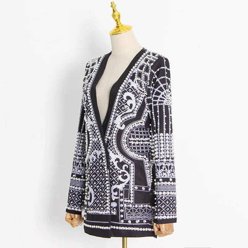 Turn heads with this mid-length slim fit blazer for women—featuring a sexy V-neck, full sleeves, regular tight waist, elegant pearl accents, and stylish splice detailing! -