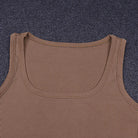 Achieve a hot and sexy look with this sleeveless knit bodysuit featuring an off-shoulder halter design. Perfect for making a stylish and alluring statement! -