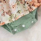 Dress your baby girl in adorable comfort with this striped cotton jumpsuit featuring a sweet bowknot—perfect for newborns! -