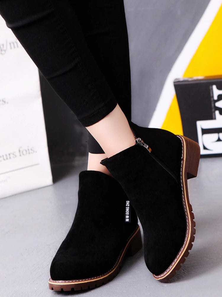 Stay stylish and cozy with these fashionable thick sole ankle boots. -